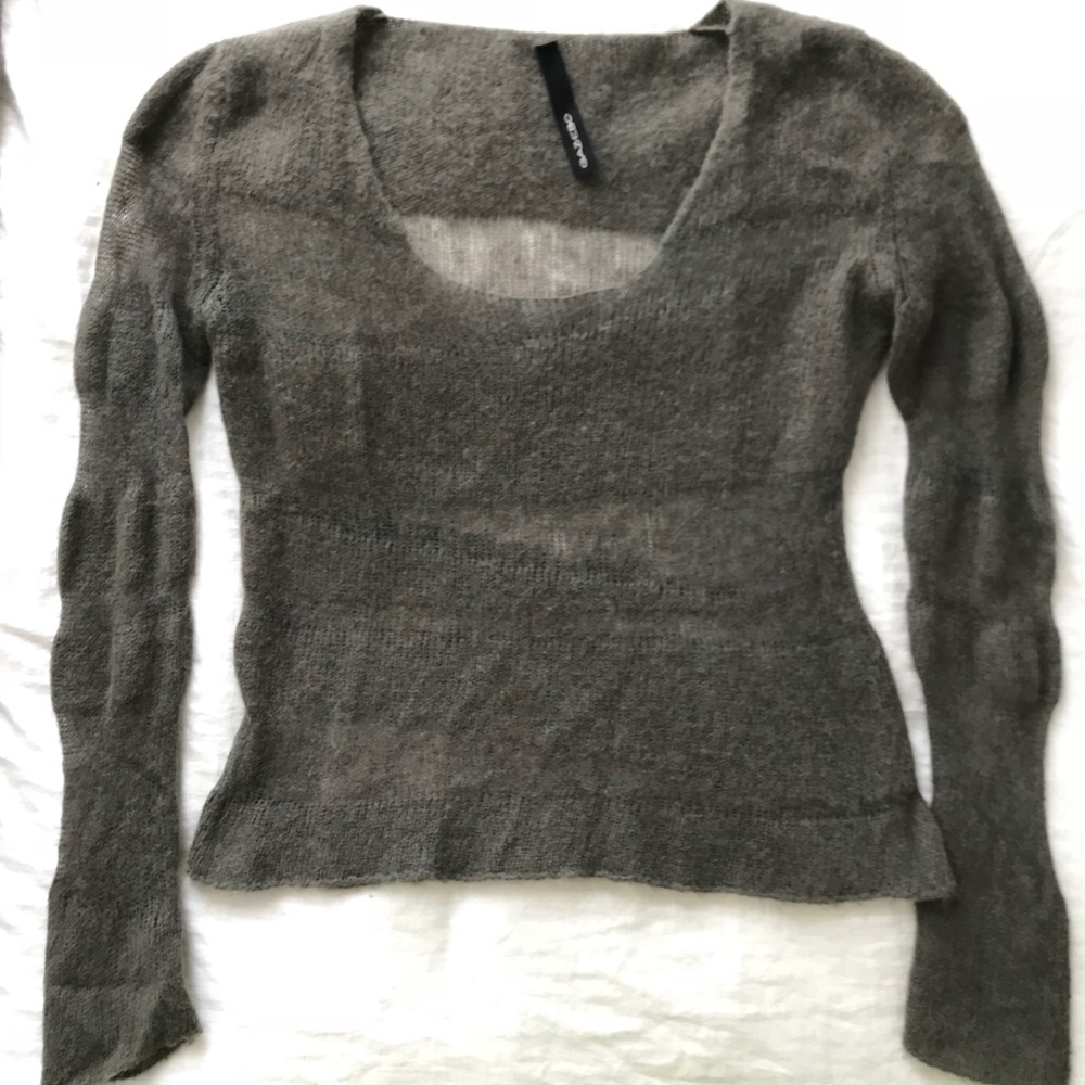 Semi transparent sweater, geometric detail